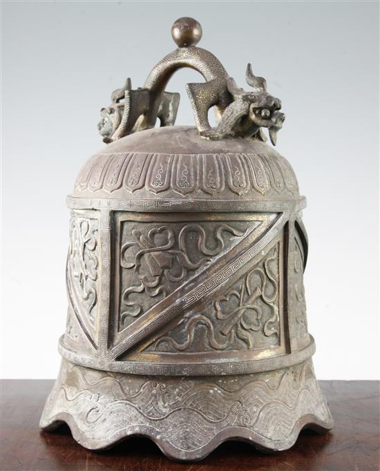 A Chinese bronze temple bell, Qing dynasty, 36cm